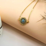 Golden Wheel Bracelet with Blue Stones
