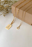 The Glyph Trinket Set Of 2: 22 Karat Gold Plated Charms With Chains